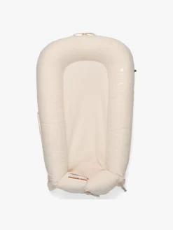 DockATot Deluxe+ Babynest, Sand Chambray